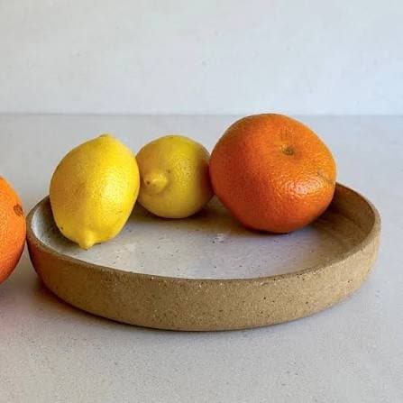 Rustic bowl with citrus fruit